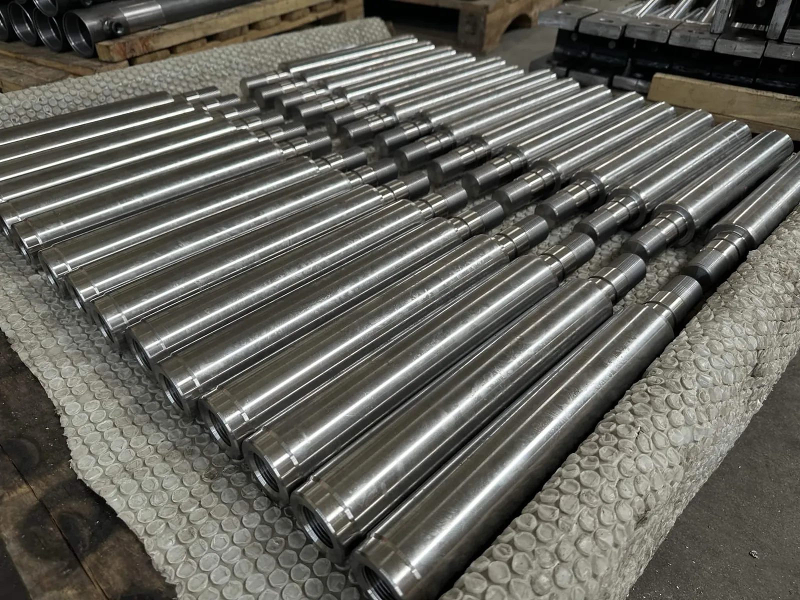 Ground piston rods lined up in rows