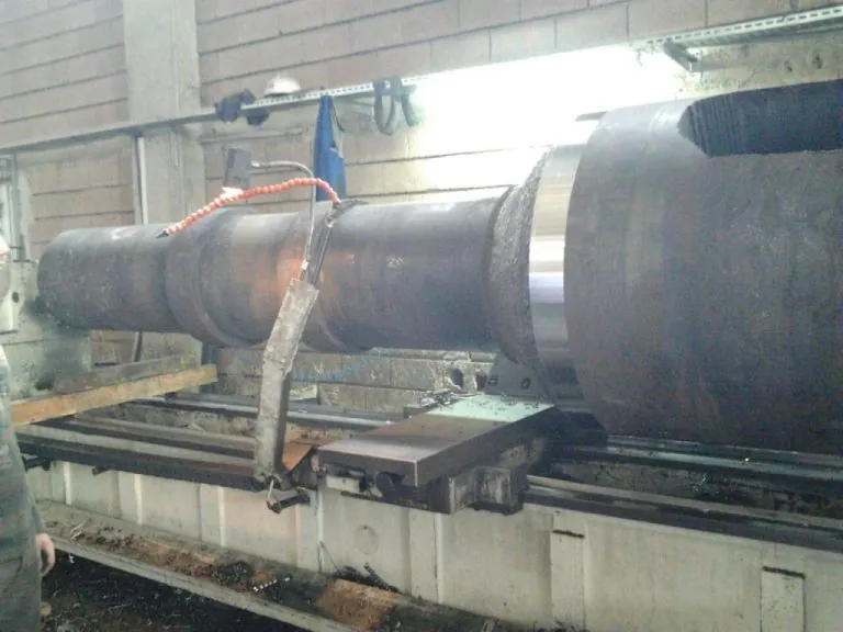 Heavy forged shaft turned on a large lathe