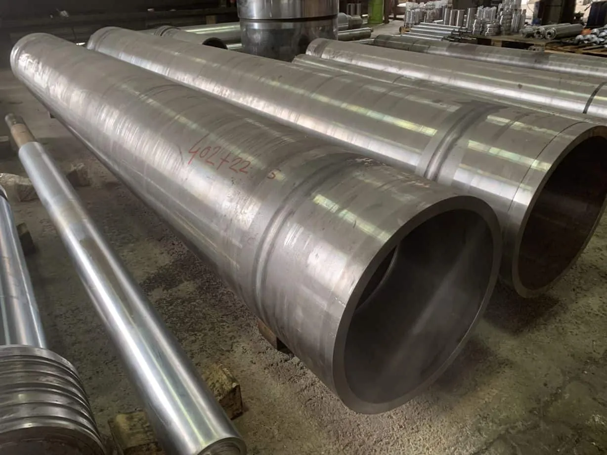 Hollow steel roller shells with machined bores