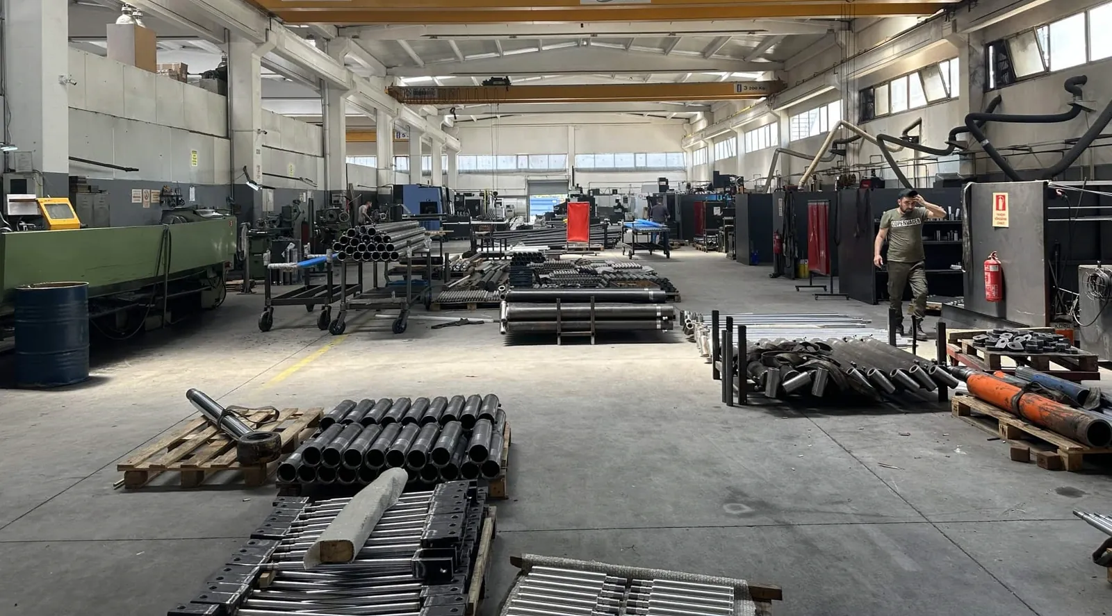 Production hall overview with machined parts