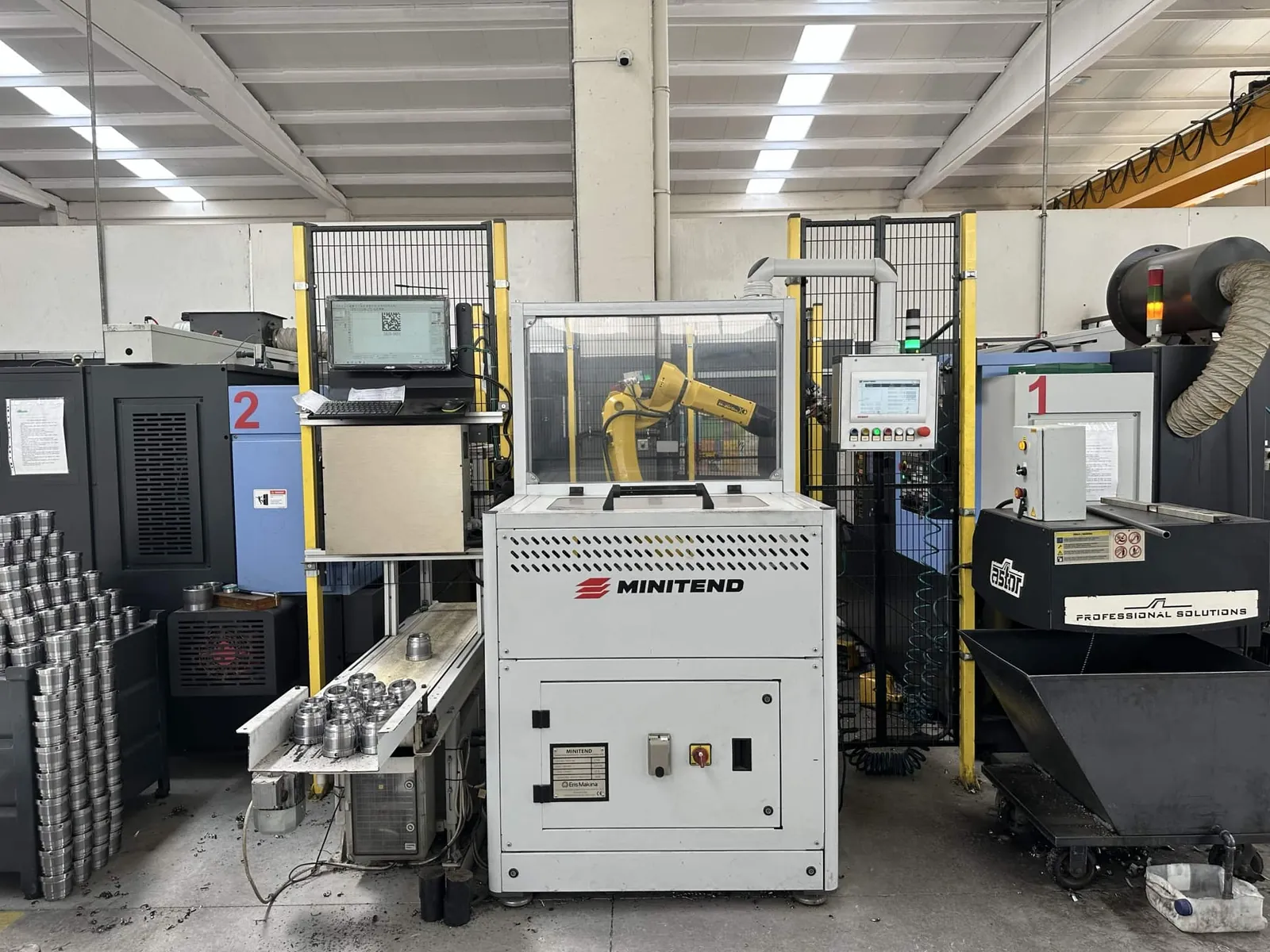 Robot-loaded CNC turning cell